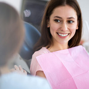 patient smiling before sedation dentistry